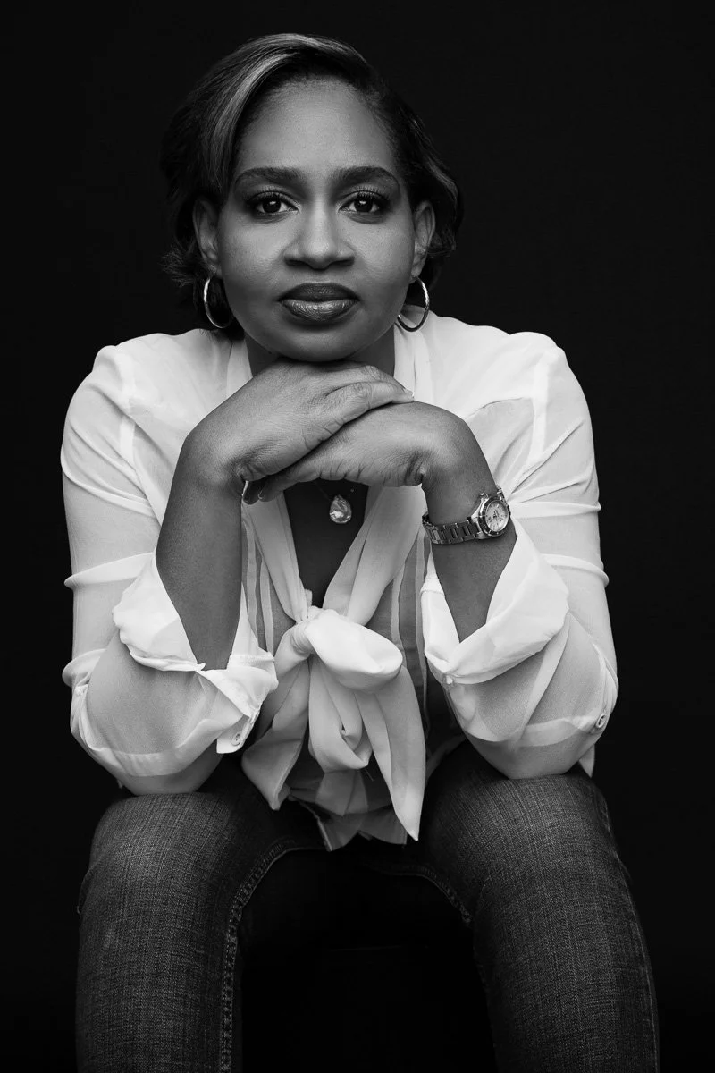 Black and white headshot of a woman photographed by Aniya Emtage Studios in Barbados