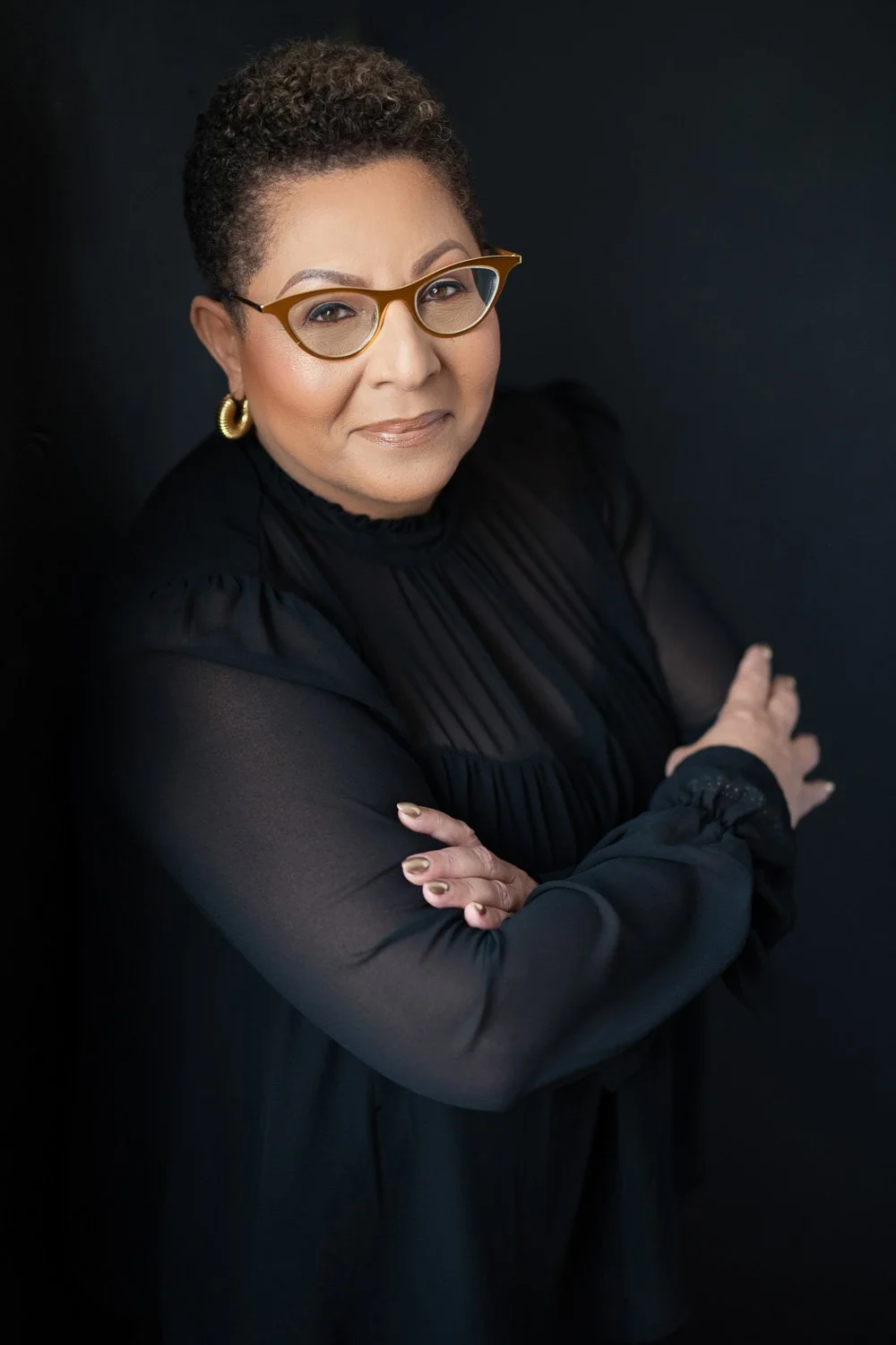 Barbados based photographer Aniya Emtage specializes in contemporary portrait photography. Aniya Emtage is known for her emotive black-and-white photography. Aniya Emtage travels worldwide for portrait commissions.
