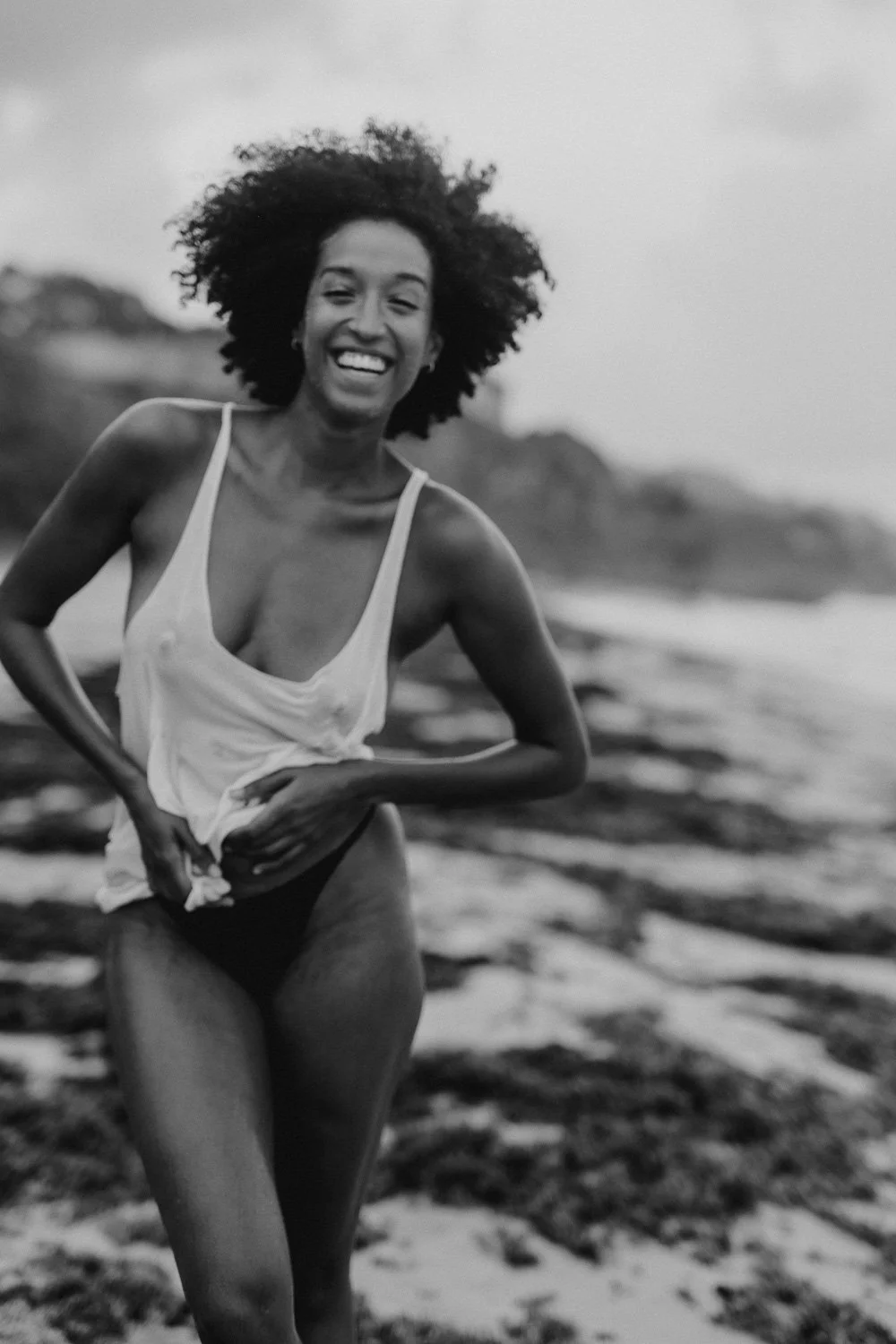 Barbados based photographer Aniya Emtage specializes in contemporary portrait photography. Aniya Emtage is known for her emotive black-and-white photography. Aniya Emtage travels worldwide for portrait commissions.