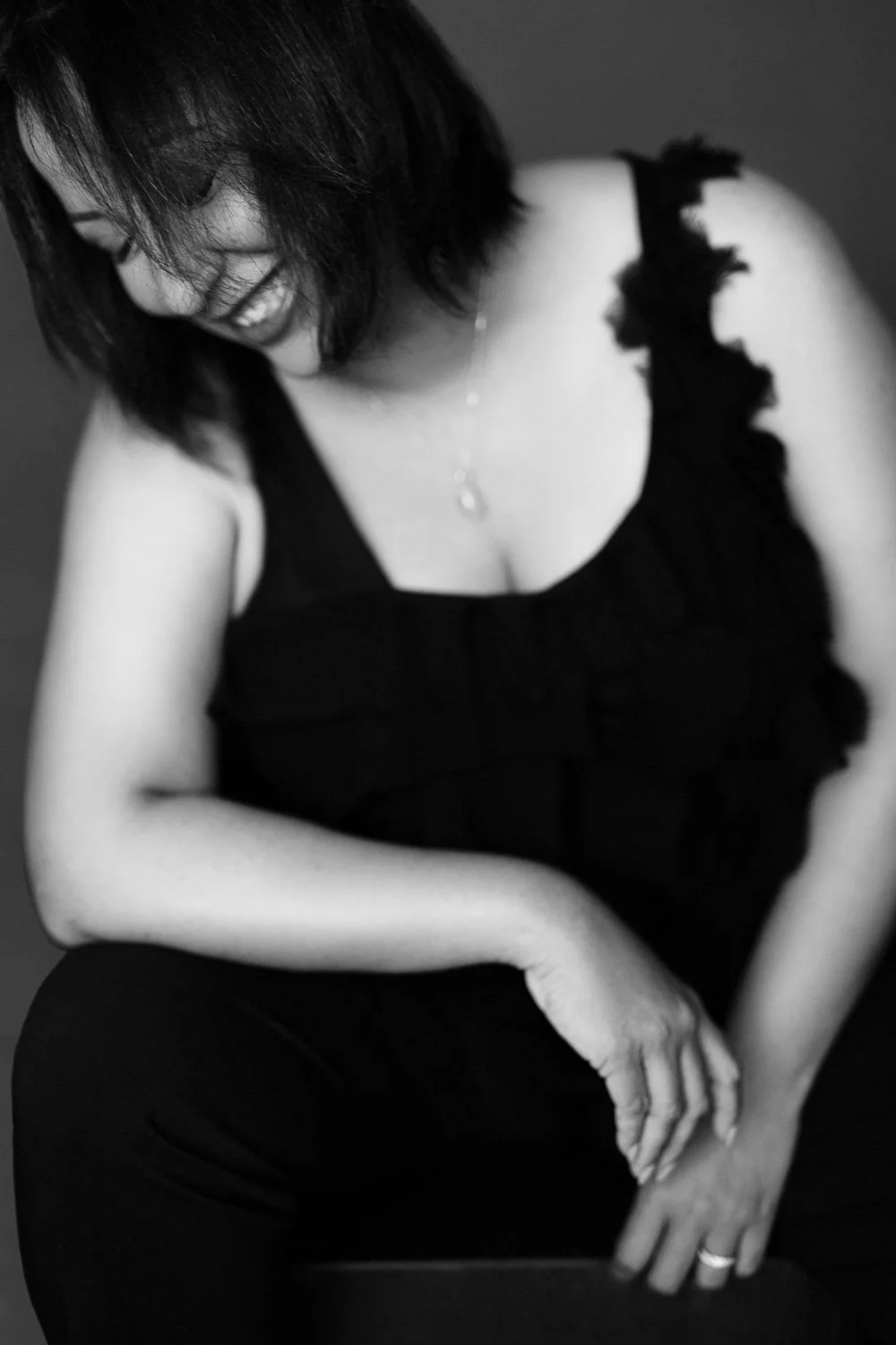 Barbados based photographer Aniya Emtage specializes in contemporary portrait photography. Aniya Emtage is known for her emotive black-and-white photography. Aniya Emtage travels worldwide for portrait commissions.
