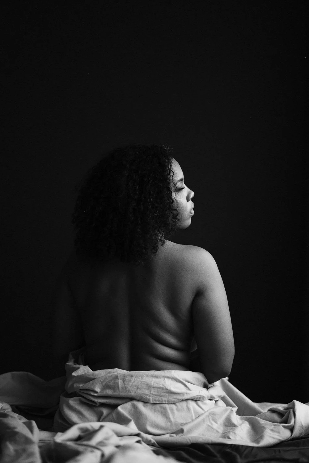 Barbados based photographer Aniya Emtage specializes in contemporary portrait photography. Aniya Emtage is known for her emotive black-and-white photography. Aniya Emtage travels worldwide for portrait commissions.