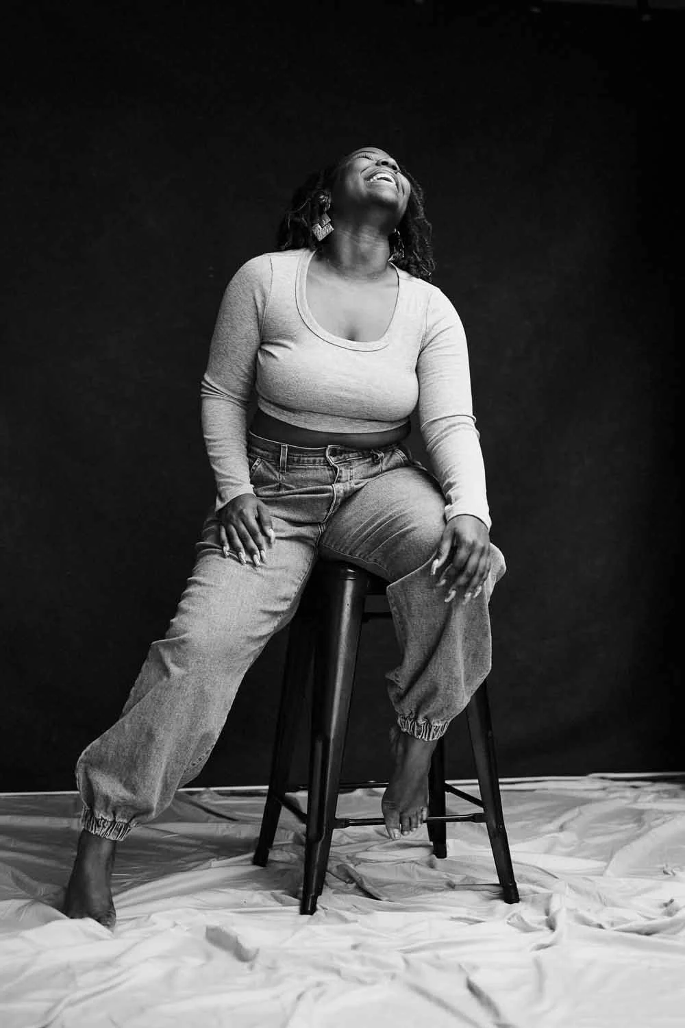 Barbados based photographer Aniya Emtage specializes in contemporary portrait photography. Aniya Emtage is known for her emotive black-and-white photography. Aniya Emtage travels worldwide for portrait commissions.