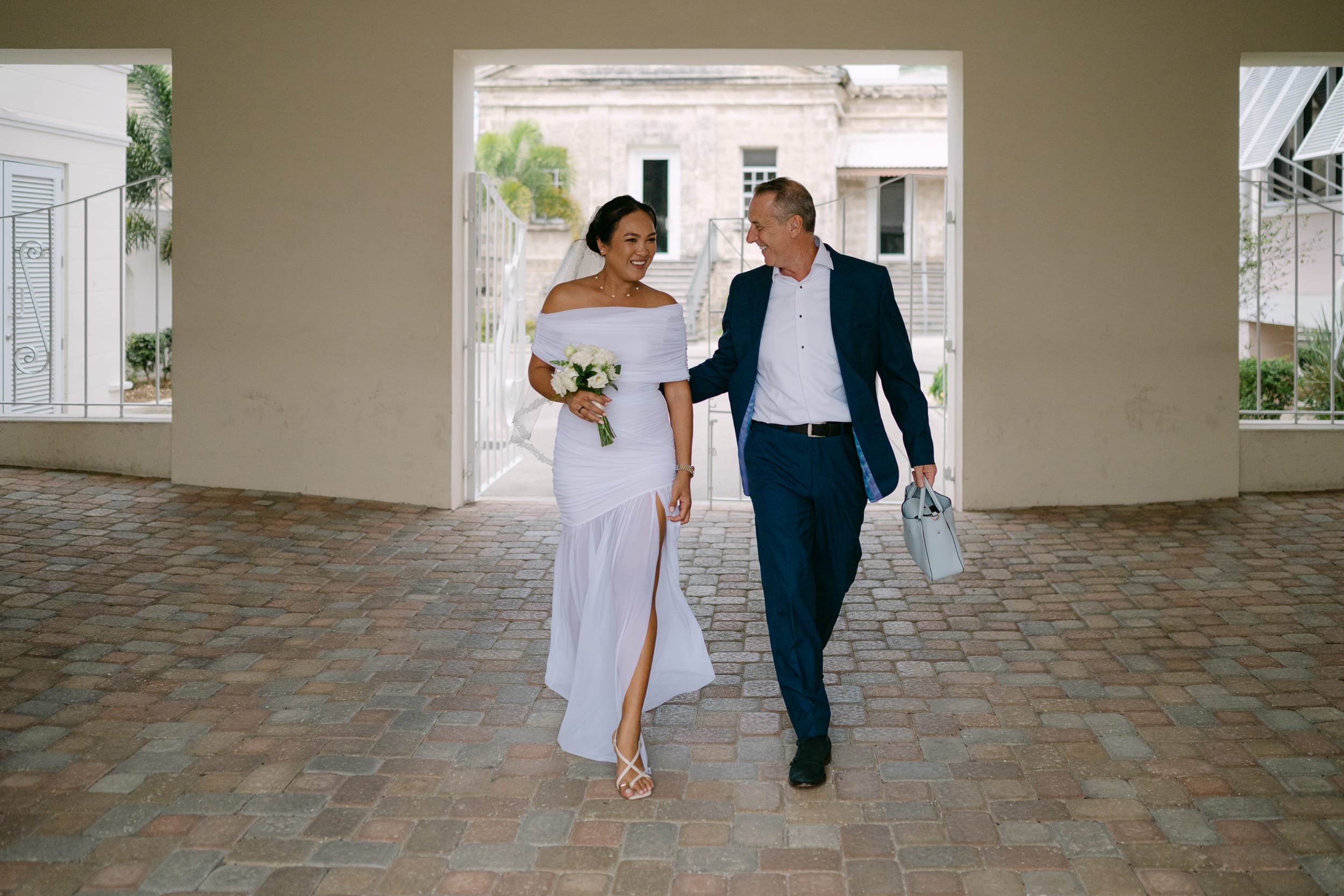 couple walking together after their barbados courthouse wedding
