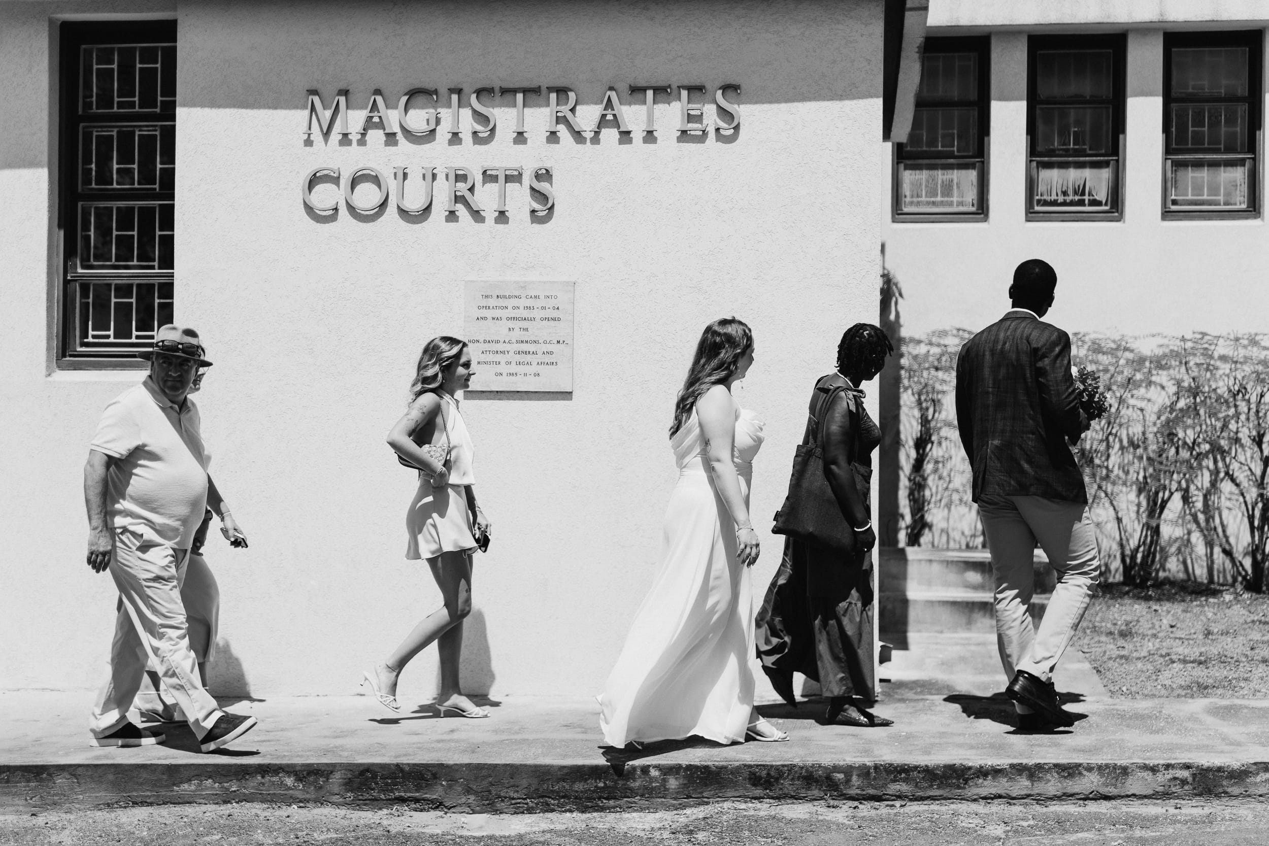 Guests walk to the room for the couples Barbados Courthouse wedding