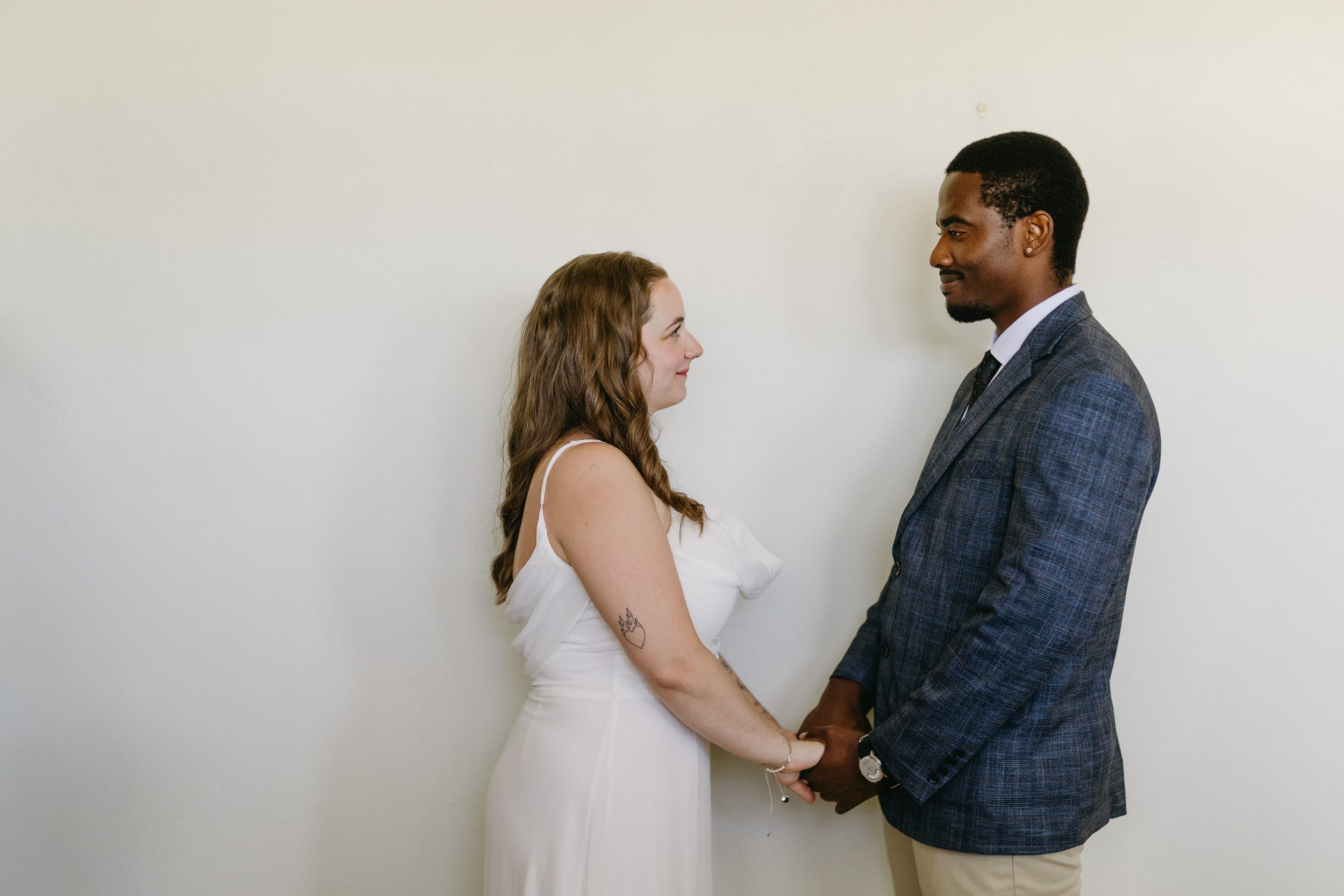 Bride and groom saying vows at their Barbados Courthouse Wedding in Oistins