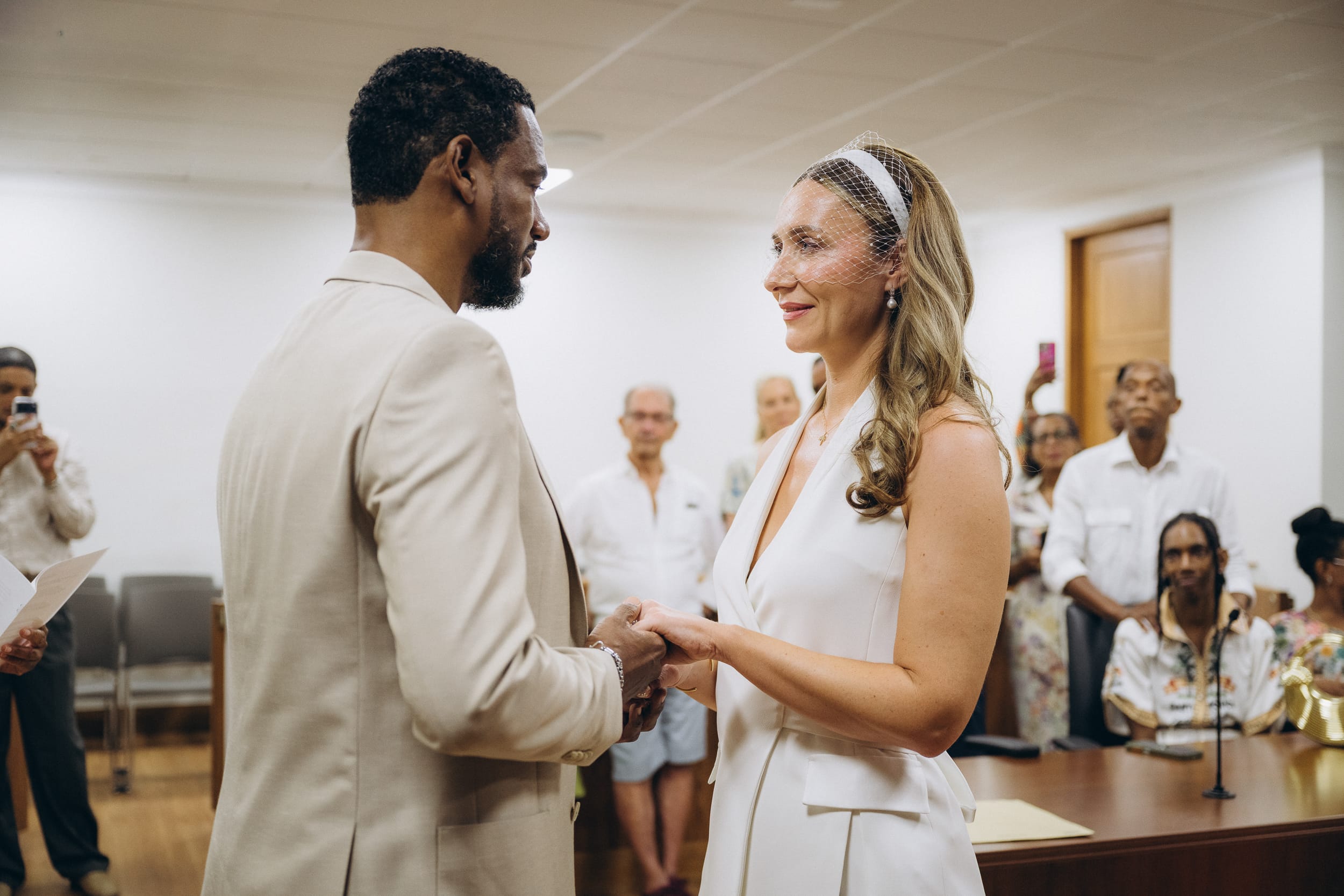 couple exchange vows at their Barbados Courthouse Wedding