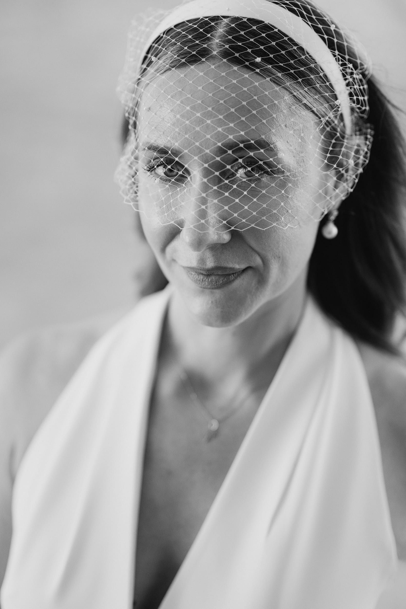 bridal portrait with bird cage vail