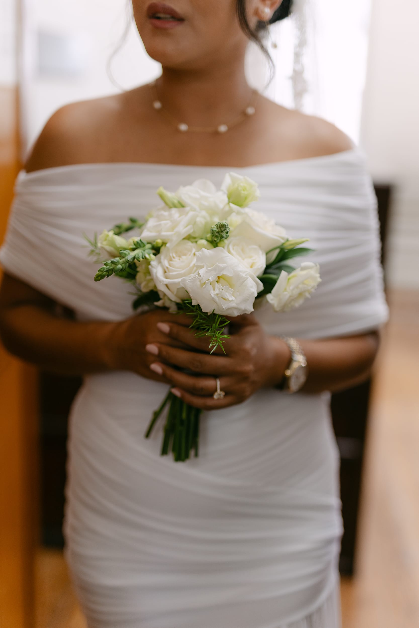 bride holding floral bouquet at her barbados courthouse wedding