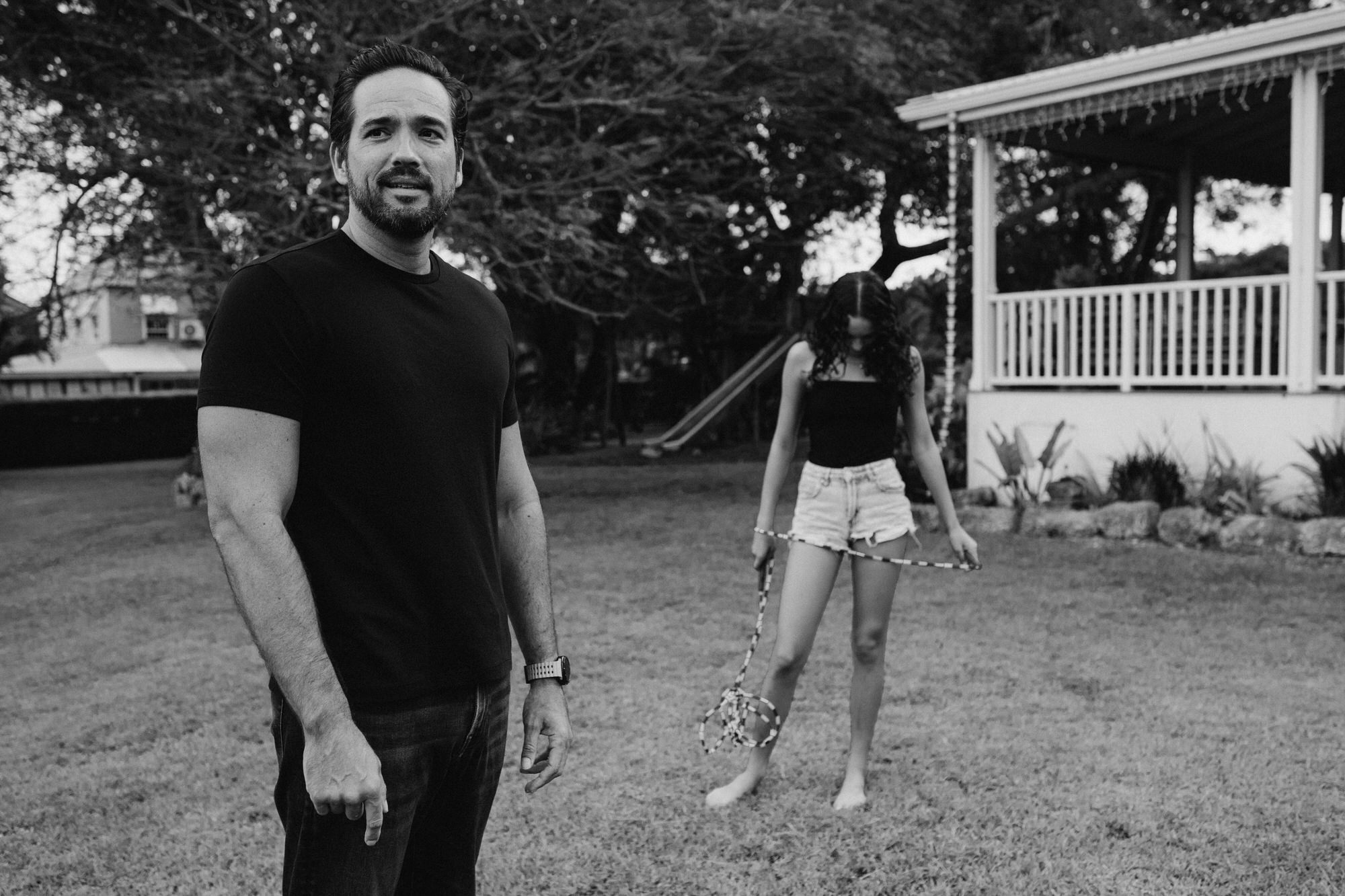 dad and daughter trying to skip