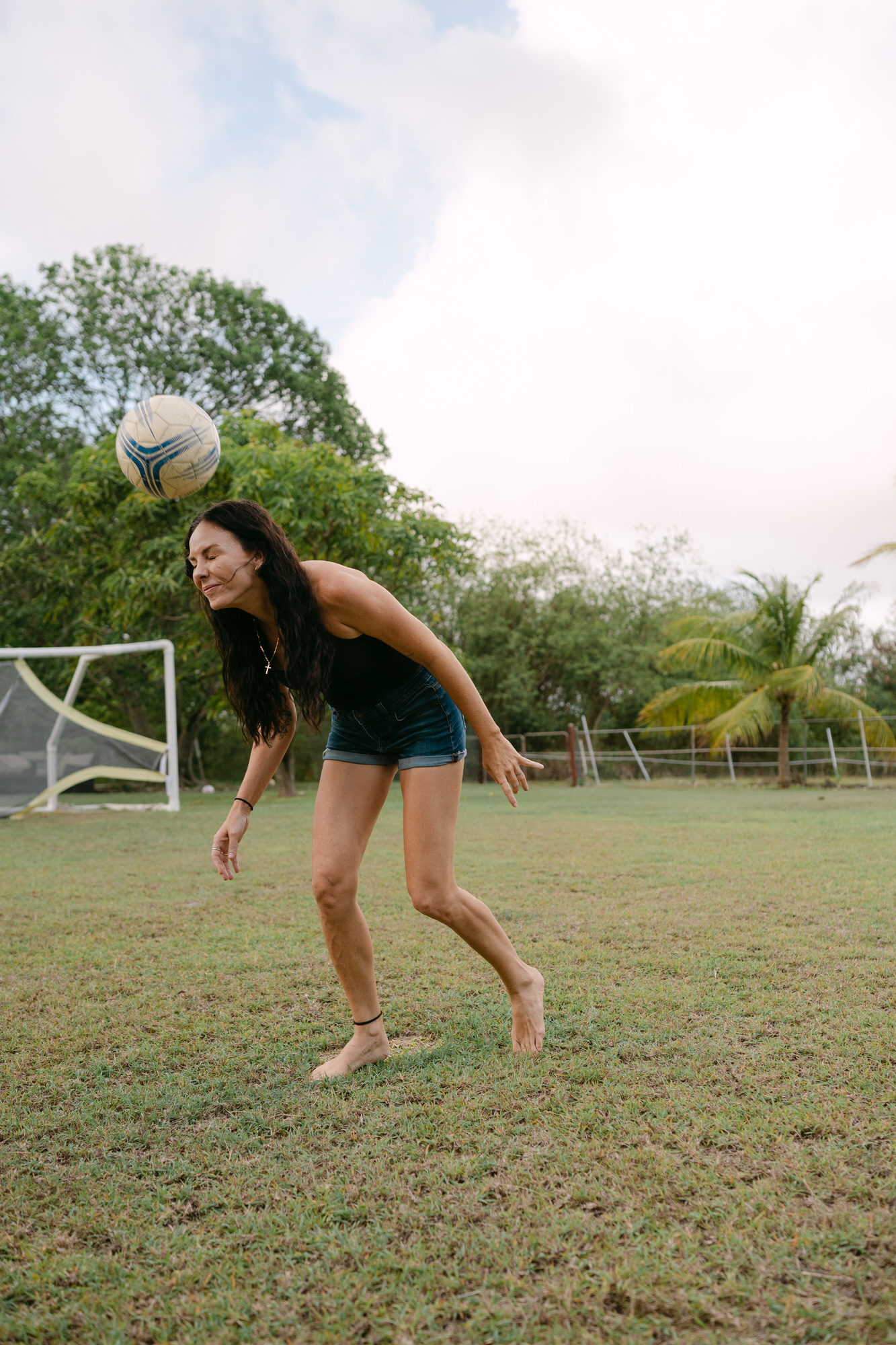 Mom doing a football header