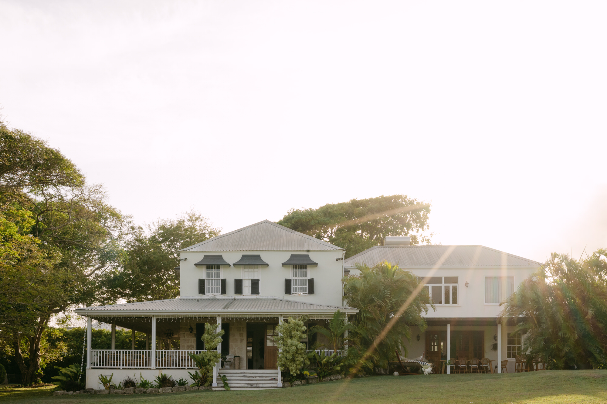 Photo of plantation home in the sunset