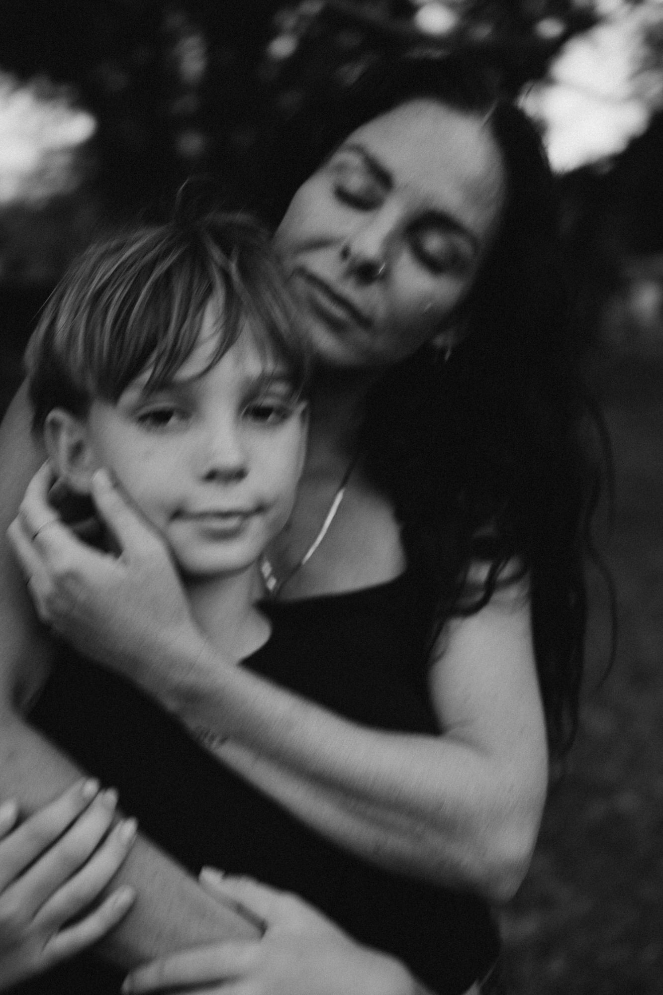 close up of mom holding her son